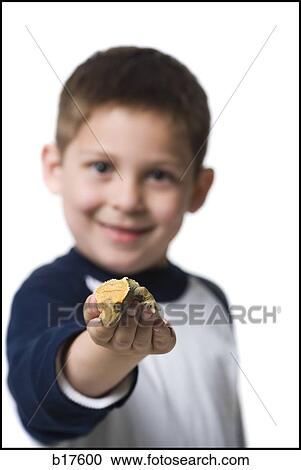 Closeup of boy holding lizard smiling View Large Photo Image Stock Image - Closeup of boy holding lizard smiling. Fotosearch