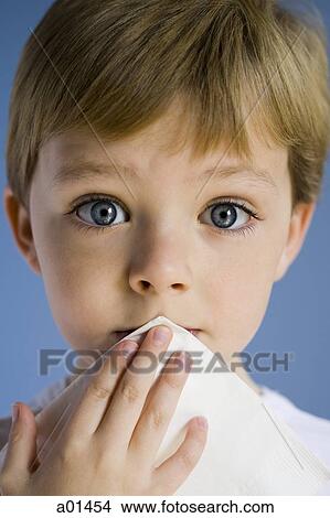 Closeup of boy holding napkin View Large Photo Image Picture - Closeup of boy holding napkin. Fotosearch