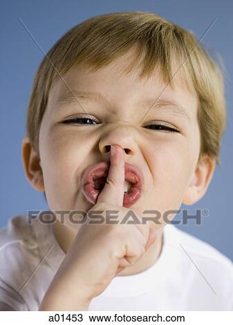 Closeup of boy hushing View Large Photo Image Stock Image - Closeup of boy hushing. Fotosearch