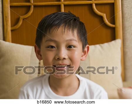 Stock Image - Closeup of boy smiling. Fotosearch