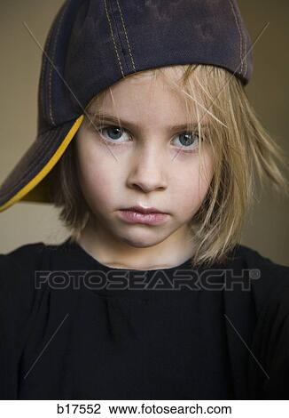 Closeup of boy with baseball cap View Large Photo Image Stock Image - Closeup of boy with baseball cap. Fotosearch