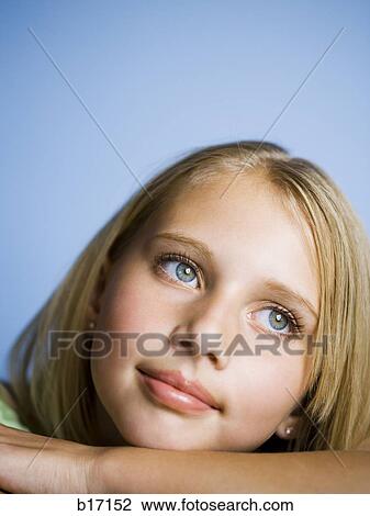 Closeup of girl looking away View Large Photo Image Stock Image - Closeup of girl looking away. Fotosearch