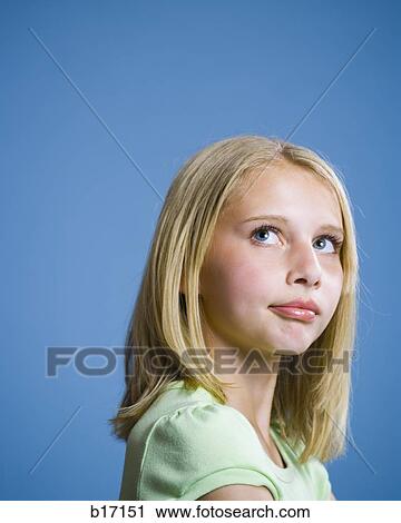 Closeup of girl looking up View Large Photo Image Stock Image - Closeup of girl looking up. Fotosearch