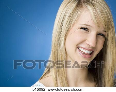 Stock Image - Closeup of girl smiling. Fotosearch