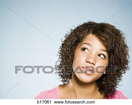 Closeup of girl thinking View Large Photo Image Stock Image - Closeup of girl thinking. Fotosearch