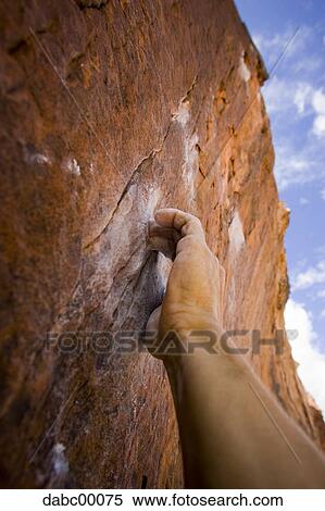 Closeup of male hand climbing mountain View Large Photo Image Stock Photography - Closeup of male hand climbing mountain. Fotosearch