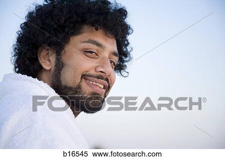 Closeup of man with beard outdoors smiling View Large Photo Image Stock Photography - Closeup of man with beard outdoors smiling. Fotosearch