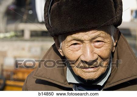 Closeup of old man with hat outdoors View Large Photo Image Stock Image - Closeup of old man with hat outdoors. Fotosearch