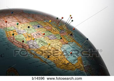 Closeup of pushpins in globe View Large Photo Image Stock Photograph - Closeup of pushpins in globe. Fotosearch