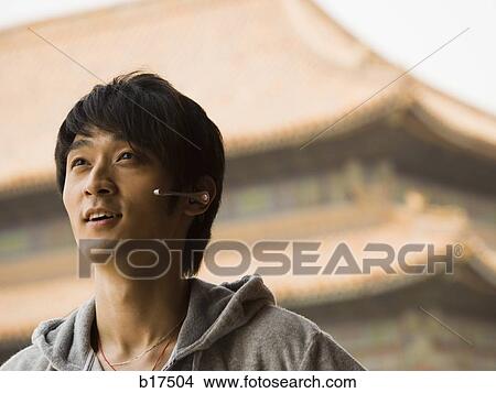Closeup of teenage boy with headset smiling View Large Photo Image Picture - Closeup of teenage boy with headset smiling. Fotosearch