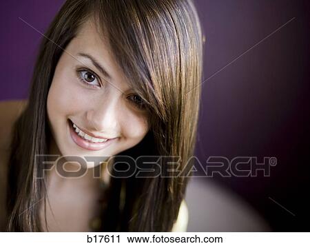 Closeup of teenage girl smiling View Large Photo Image Stock Image - Closeup of teenage girl smiling. Fotosearch