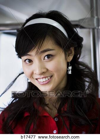 Closeup of teenage girl smiling View Large Photo Image Stock Photo - Closeup of teenage girl smiling. Fotosearch