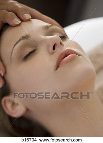 Closeup of woman getting head massage View Large Photo Image Picture - Closeup of woman getting head massage. Fotosearch