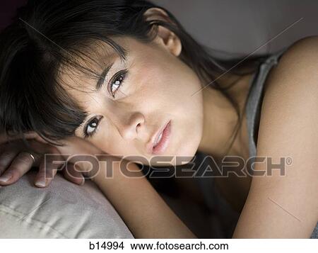 Closeup of woman lying down View Large Photo Image Picture - Closeup of woman lying down. Fotosearch