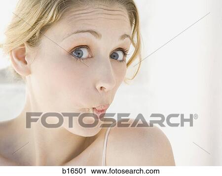 Closeup of woman puckering lips View Large Photo Image Stock Image - Closeup of woman puckering lips. Fotosearch