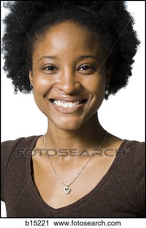 Stock Image - Closeup of woman smiling. Fotosearch