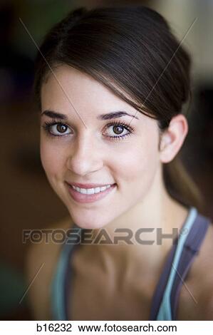 Stock Image - Closeup of woman smiling. Fotosearch
