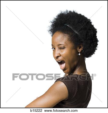 Closeup of woman winking View Large Photo Image Stock Image - Closeup of woman winking. Fotosearch