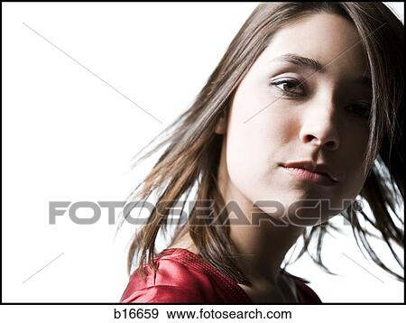Closeup of woman with blowing hair View Large Photo Image Stock Photo - Closeup of woman with blowing hair. Fotosearch