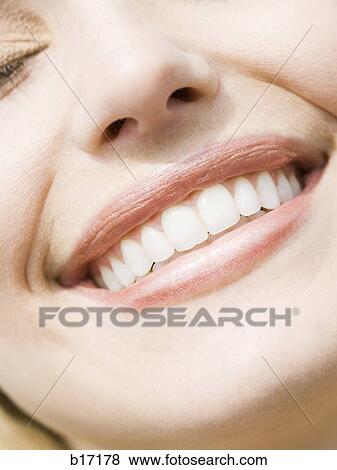 Closeup of woman with eyes closed View Large Photo Image Stock Photo - Closeup of woman with eyes closed. Fotosearch