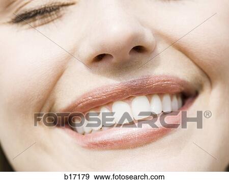 Closeup of woman with eyes closed View Large Photo Image Stock Photo - Closeup of woman with eyes closed. Fotosearch
