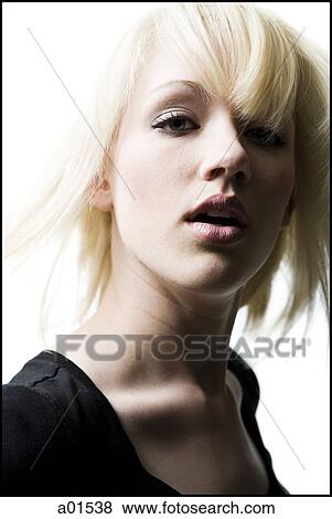Closeup of woman with tossed hair View Large Photo Image Stock Photo - Closeup of woman with tossed hair. Fotosearch