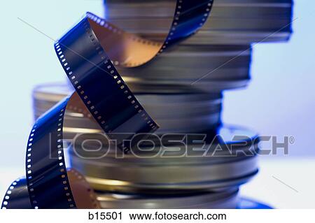 Coiled film strip and canisters View Large Photo Image Stock Image - Coiled film strip and canisters. Fotosearch