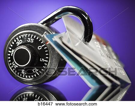 Combination lock with four bank cards View Large Photo Image Stock Photo - Combination lock with four bank cards. Fotosearch