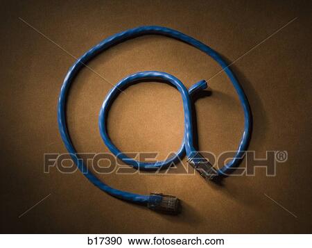 Computer cable forming at sign View Large Photo Image Stock Image - Computer cable forming at sign. Fotosearch