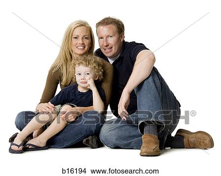 Picture - Couple sitting cross legged with child. Fotosearch