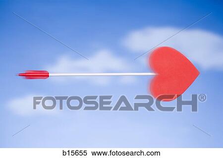 Cupid's arrow with blue sky View Large Photo Image Stock Photography - Cupid's arrow with blue sky. Fotosearch