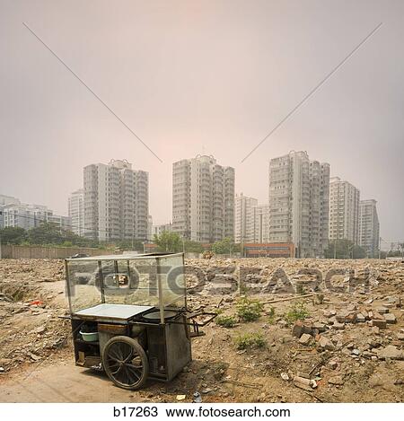 Stock Image - Detail of city skyline with garbage and urban blight. Fotosearch