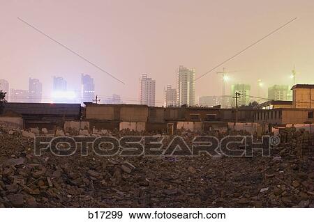 Stock Photo - Detail of city street with garbage and urban blight. Fotosearch