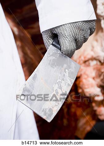 Stock Image - Detailed view of butcher's knife. Fotosearch