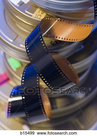 Stock Photo - Detailed view of coiled film and film canisters. Fotosearch