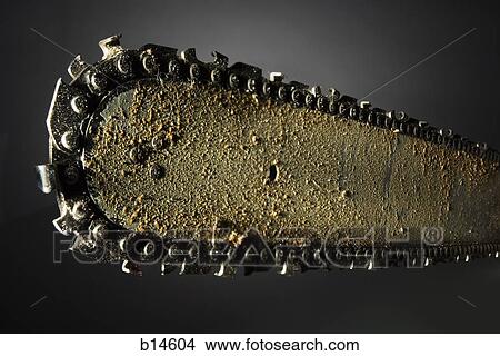 Detailed view of dirty chainsaw View Large Photo Image Picture - Detailed view of dirty chainsaw. Fotosearch
