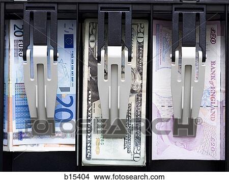 Detailed view of International currency in till View Large Photo Image Picture - Detailed view of International currency in till. Fotosearch
