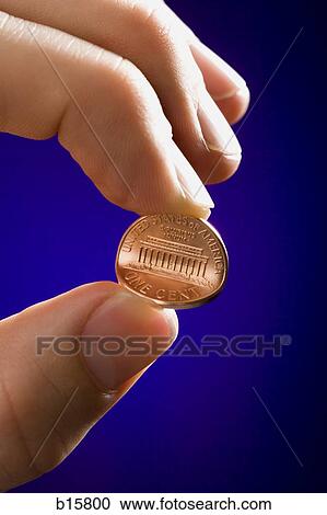 Detailed view of male hand bending penny View Large Photo Image Stock Image - Detailed view of male hand bending penny. Fotosearch
