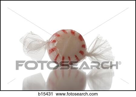Stock Image - Detailed view of striped mint in wrapper. Fotosearch