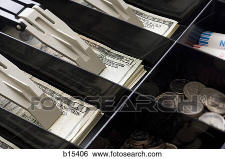 Detailed view of US currency and coins in till View Large Photo Image Stock Photograph - Detailed view of US currency and coins in till. Fotosearch