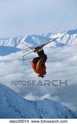 Downhill ski jumper in air View Large Photo Image Picture - Downhill ski jumper in air. Fotosearch