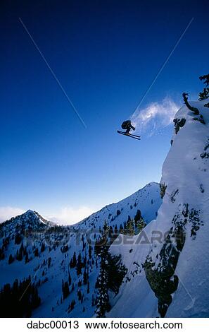 Downhill ski jumper in air View Large Photo Image Stock Image - Downhill ski jumper in air. Fotosearch