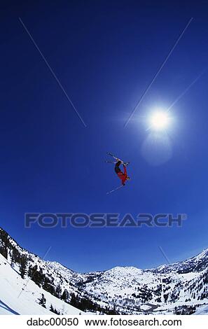 Downhill ski jumper in air View Large Photo Image Stock Image - Downhill ski jumper in air. Fotosearch