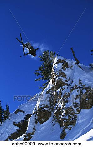 Downhill ski jumper in air View Large Photo Image Stock Photo - Downhill ski jumper in air. Fotosearch