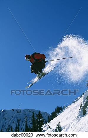 Downhill ski jumper in air View Large Photo Image Stock Photo - Downhill ski jumper in air. Fotosearch