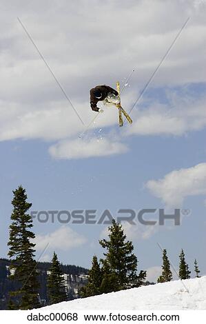 Downhill ski jumper in air View Large Photo Image Stock Photo - Downhill ski jumper in air. Fotosearch