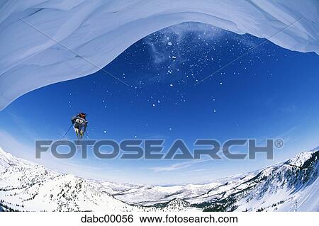 Downhill ski jumper in air View Large Photo Image Stock Photograph - Downhill ski jumper in air. Fotosearch