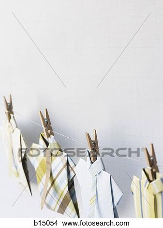 Dress shirts on clothesline with clothes pegs View Large Photo Image Picture - Dress shirts on clothesline with clothes pegs. Fotosearch