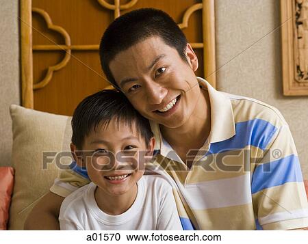 Father and son smiling View Large Photo Image Stock Image - Father and son smiling. Fotosearch