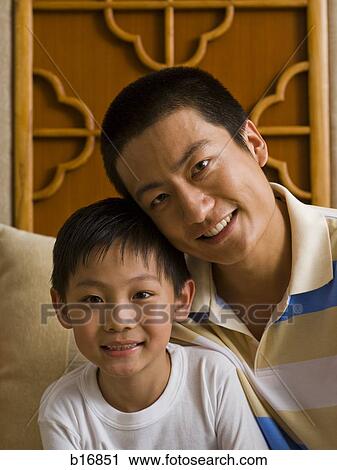 Father and son smiling View Large Photo Image Stock Image - Father and son smiling. Fotosearch